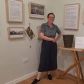Rustington Museum manager Claire Lucas with the ironing board made at St Dunstan's, the original name for Blind Veterans UK