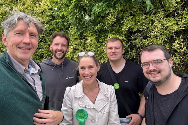 Green canvassers door knocking in Handcross.