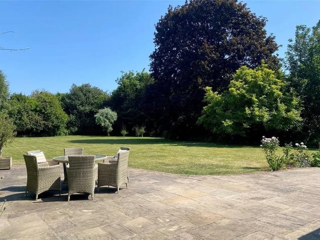 The home comes with a 0.7 acre secluded garden.