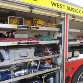 Firefighters have been called to a blaze at an industrial unit in a West Sussex village