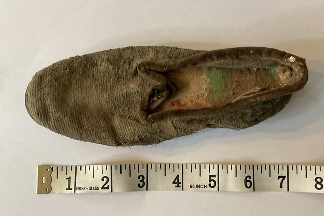 The shoe is said to be that of a young woman