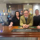 Horsham's The Star pub landlady Lyndsay Wilson with MP Jeremy Quin and Simon Williams.