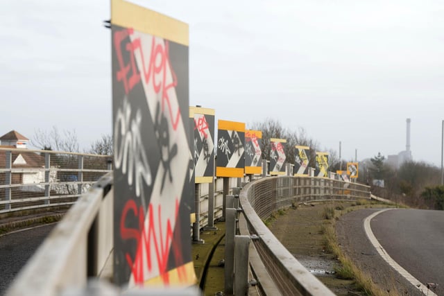 A27 emergency access blocked by fly-tipping; road signs vandalised