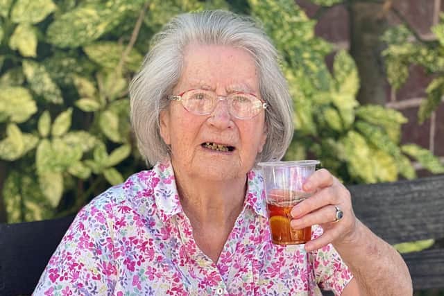 One of the residents at Hollywynd Rest Home enjoying a Pimm's