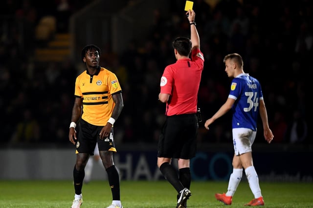 Adebayo Azeez receives a yellow card.