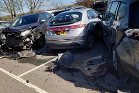 Several smashed vehicles were seen at the Lido car park in Arundel on Good Friday. Photo: Sean Barriskill