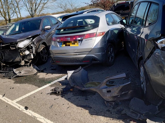 Several smashed vehicles were seen at the Lido car park in Arundel on Good Friday. Photo: Sean Barriskill