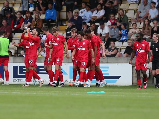 Action from Worthing's 3-0 win at Torquay United which put them top of National League South