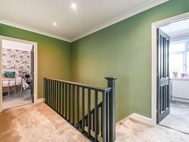 The second floor has access to several bedrooms.