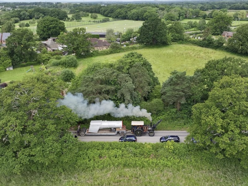A vintage steam engine was seen slowly hauling a heavy load though Burgess Hill on Wednesday, June 12