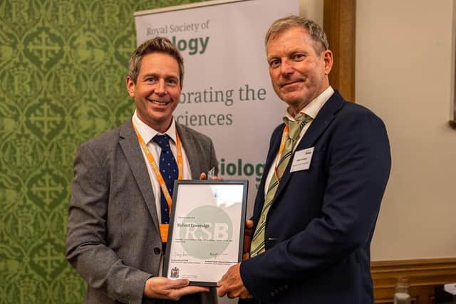 Robert Loveridge, right, receiving the School Biology Teacher of the Year Award from Royal Society of Biology CEO Dr Doug Brown