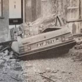 Car crushed by rubble at Hastings