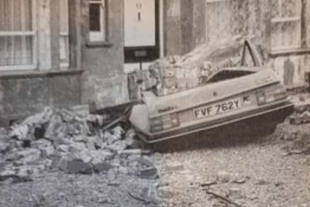 Car crushed by rubble at Hastings