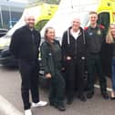 Retired health and safety officer, Dave Mortimer, third from left, visited South East Coast Ambulance Service’s Make Ready Centre in Crawley to pass on his thanks in person for the team’s effort. Picture courtesy of SECAmb