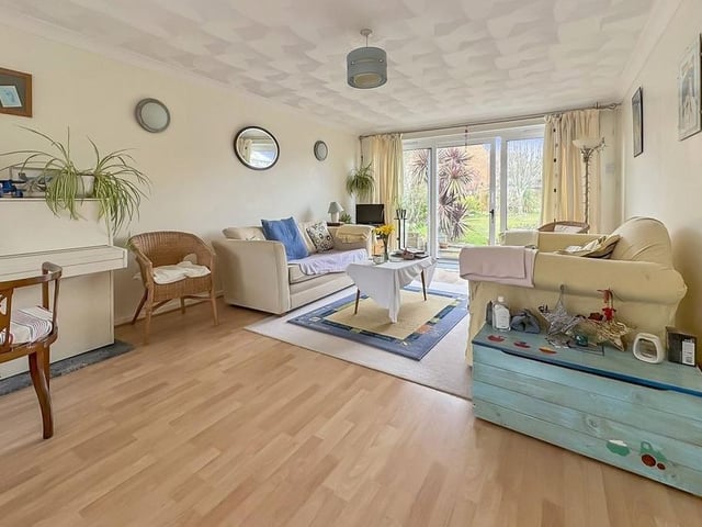The large lounge has doors to the garden