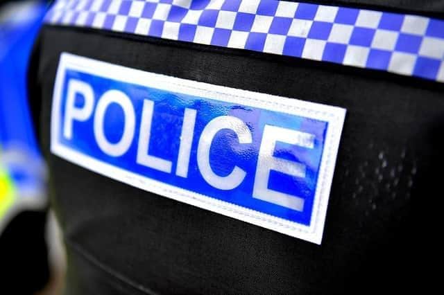 Police are appealing for witnesses to an altercation inside a shop in Crawley.