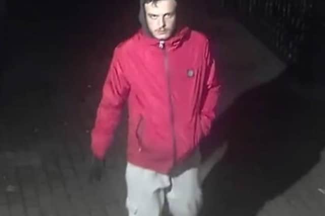 Police investigating a robbery in Horsham have released a CCTV image of a man they would like to speak to. Picture courtesy of Sussex Police