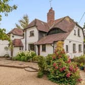 This four-bedroom property in West Chiltington has stunning gardens and a roof terrace. It is on sale with a guide price of £1,150,000