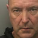 Surrey Police are appealing for the public’s help to find Gregory Pawsey, 54, from London, who we would like to speak to in connection with an investigation of robbery in Redhill. Picture courtesy of Surrey Police