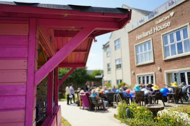 Ice cream kiosk and residents in the garden at Haviland House in Worthing. Picture: Guild Care / Submitted