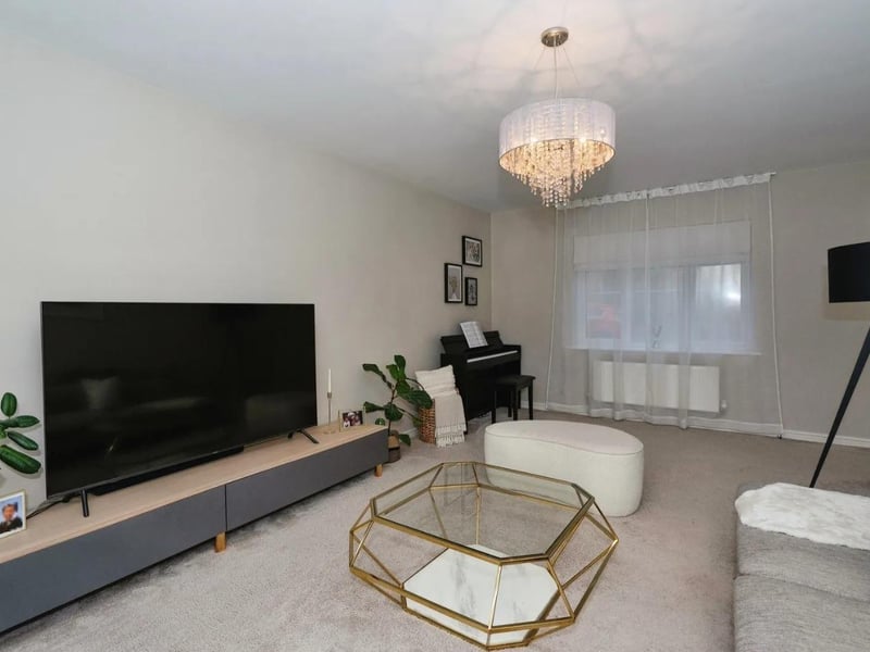 There is a double aspect sitting room downstairs