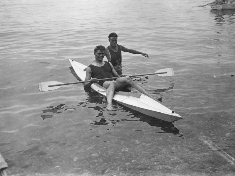 British Heavyweight Champion Phil Scott training at Brighton in an canoe on 20th August 1925.