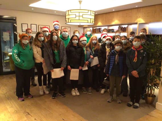 Scouts perform carols for care home residents at Goldbridge, Haywards Heath