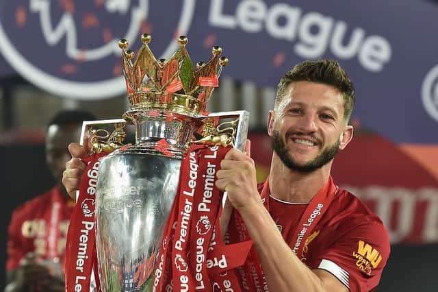 Adam Lallana of Liverpool with the Premiership Trophy the Premier League match between Liverpool FC and Chelsea FC at Anfield on July 22, 2020 in Liverpool, England. (THE SUN ON SUNDAY OUT) (Photo by John Powell/Liverpool FC via Getty Images)