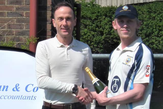 Jon Sanders from Newhaven Cricket Club's Main Sponsor, Tasker Osman & Co Financial Accountants, presented a bottle of champagne to the Newhaven captain Jonathan Bennett
