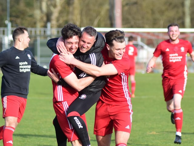 On their way to the title - Hassocks celebrate their third goal v Crowborough | Picture: Phil Dennett