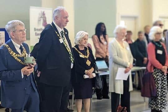 Invited guests listen in as Lord Lieutenant Andrew Blackman offers congratulations to the chosen charities