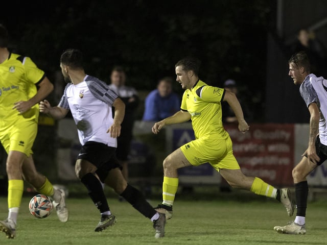 Evan Harris (centre) leads a Selsey attack