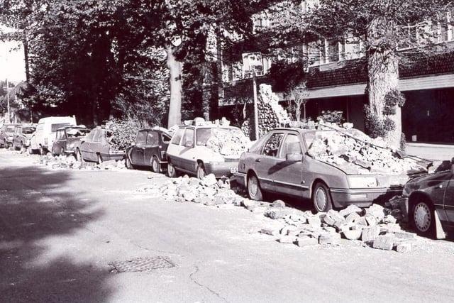 Cars damaged by the storm.