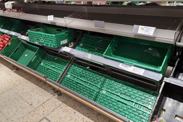Empty shelves at Burgess Hill Waitrose. Pic S Robards SR2305301