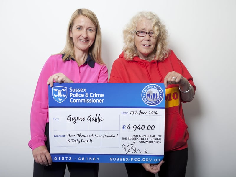 Pat Fisher from GIZMO receiving funding from Sussex Police & Crime Commissioner, Katy Bourne. Picture taken in 2014