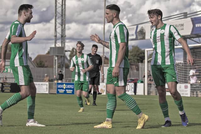 Chichester City celebrate one of the goals that saw off Lancing at Nyewood Lane | Picture: Neil Holmes