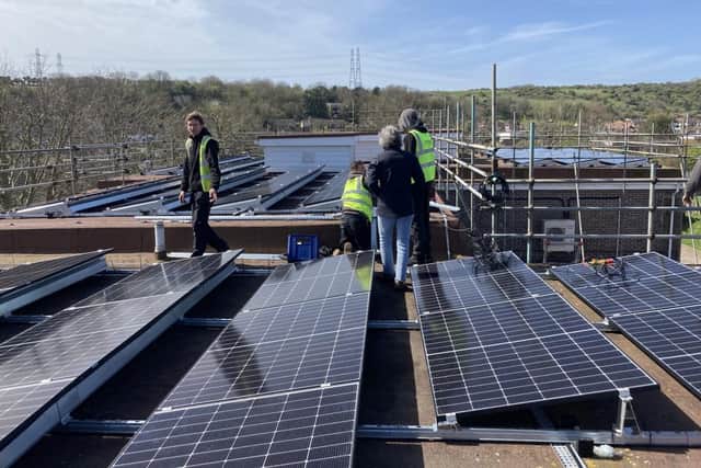 Solar panels being installed on Mile Oak Primary School in Hove.