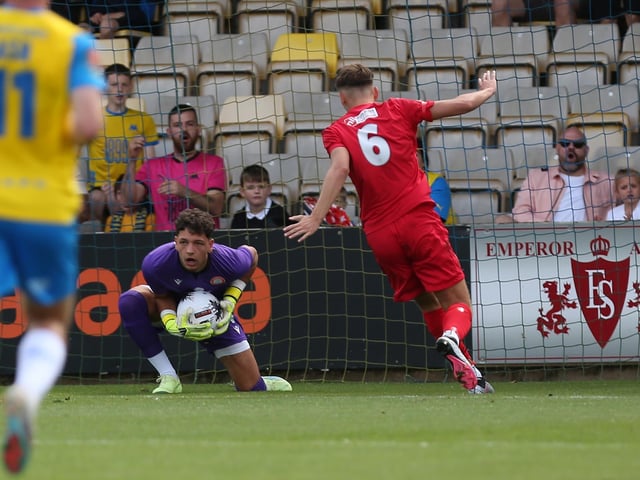 Action from Worthing's 3-0 win at Torquay United which put them top of National League South
