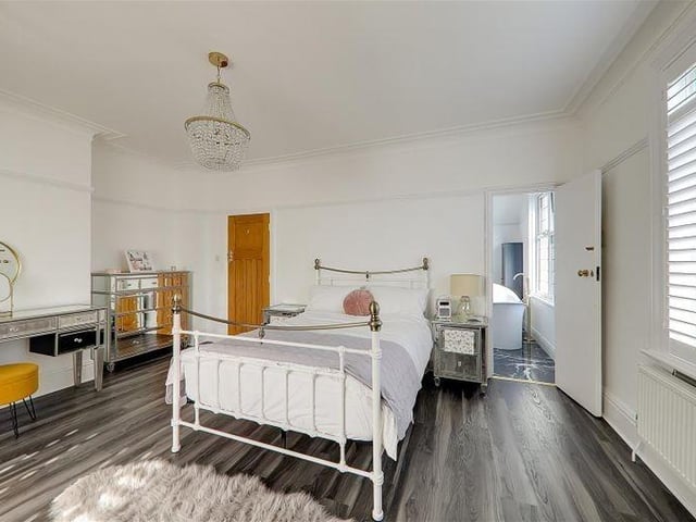 The master bedroom has a luxury en-suite bathroom