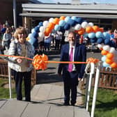 Mary McGregor with New Horizons Seaside Primary School head Lee Murley, cutting the ribbon to officially open the new sports hall in memory of mentor Peter McGregor. Photo by Elaine Hammond / Sussex World