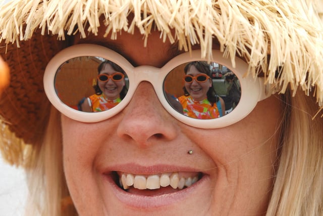 Ready to party in August 2010 - Sue Wright, with her sister Jo Reeves reflected in her glasses