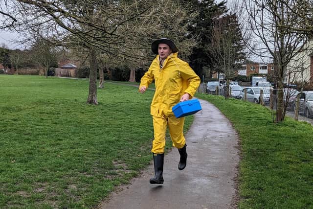 A worker for a Chichester charity is aiming to break the marathon world record dressed as a fisherman at the upcoming London Marathon.