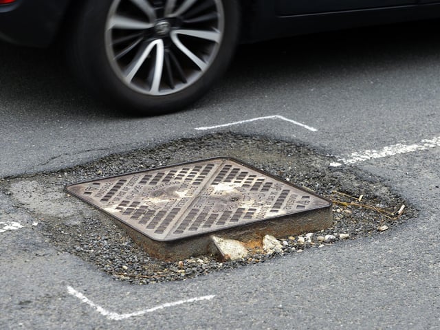 Potholes in Jevington Road, Polegate (Photo by Jon Rigby)