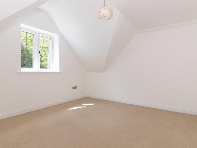 Offers in excess of £900,000 are invited for this new luxury property in Mill Lane, High Salvington. It has beautiful views over the South Downs, versatile and spacious accommodation.