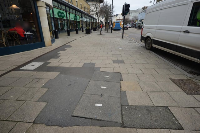Photo showing the state of the pavement in Hastings town centre. 31/1/24. Queens Road.
