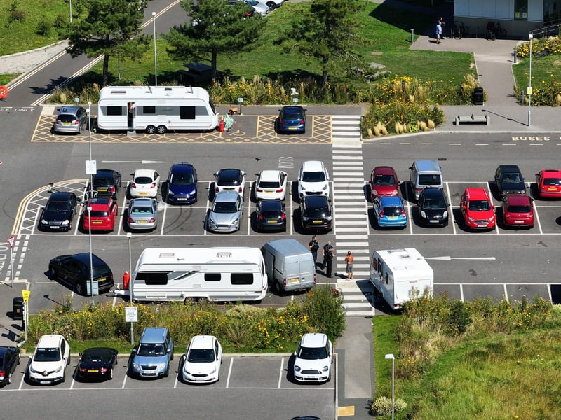 Multiple caravans have parked outside Littlehampton Wave in Sea Road and the police have been called.