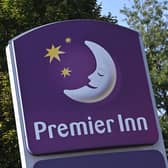Despite announcing a significant rise in returns to shareholders, The Premier Inn’s owner, Whitbread, will cut 1,500 jobs across the UK and shut 126 restaurants. (Photo by PAUL ELLIS/AFP via Getty Images)