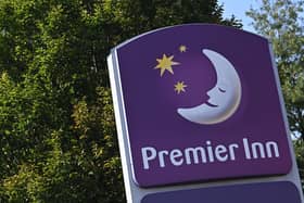 Despite announcing a significant rise in returns to shareholders, The Premier Inn’s owner, Whitbread, will cut 1,500 jobs across the UK and shut 126 restaurants. (Photo by PAUL ELLIS/AFP via Getty Images)