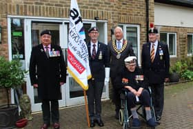 HDC Chairman Cllr David Skipp presenting the new Standard to Crawley & Horsham Armed Forces & Veterans Breakfast Club. Picture: Horsham District Council
