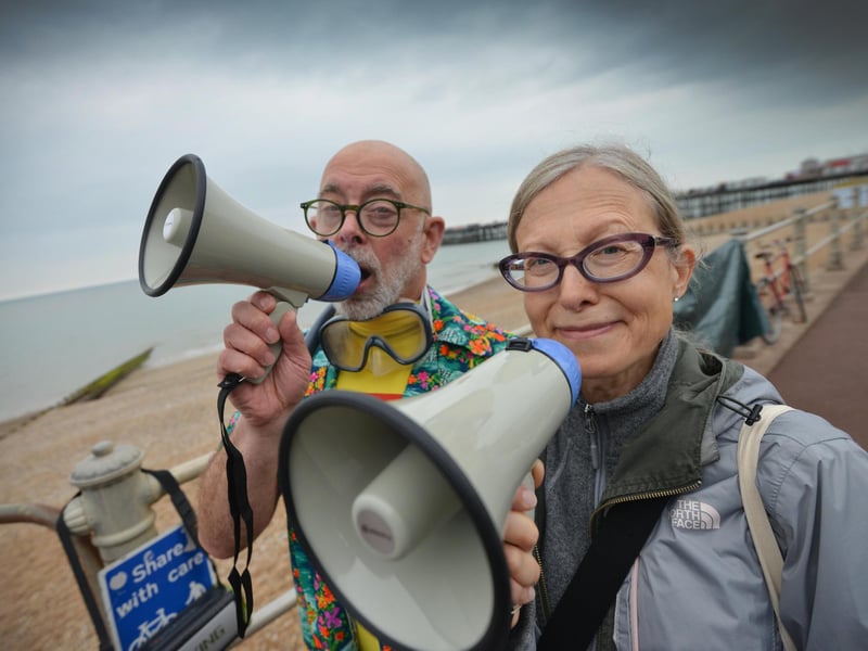 Surfers Against Sewage Paddle-Out protest in Hastings on May 18 2024. Event organisers Jemima Gibbons and Barny Green.